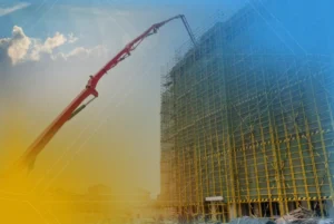 Caminhão de bombeamento de concreto em ação, fornecendo concreto para a construção de um edifício