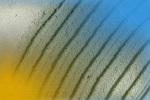 Superfície de concreto verde texturizada, representando a sustentabilidade na construção civil